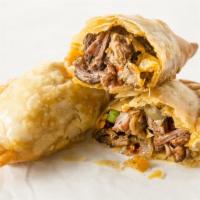 3. Steak Empanada · All- Natural Premium Beef, Onions (Yellow, Green, Red), Red Bell Pepper, Green Olives, Blend...