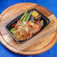 Sundried Tomato and Spinach Stuffed Chicken Breast · Served with roasted potatoes and asparagus.
