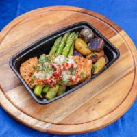 Sundried Tomato and Spinach Stuffed Salmon · Served with roasted potatoes and asparagus.
