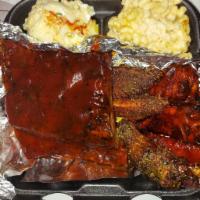 Rib and Wing Combo · BBQ ribs with 6 wings of your flavor and three sides of your choice.