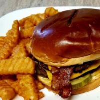 Bacon Cheese Burger · Choice of American, Swiss or cheddar cheese, topped with lettuce, tomato, and red onions, on...
