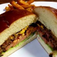 Bourbon Burger · Cheddar cheese, bacon, sauteed mushrooms, roasted bell peppers, lettuce, red onions, and tom...