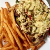 Philly Cheesesteak Sandwich · Chopped sirloin steak, sliced Swiss cheese, roasted bell peppers, mushrooms with a chili aio...