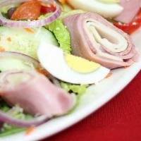 Chef Salad · House salad topped with sliced turkey, ham, salami, yellow American cheese, provolone and ha...