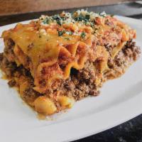Homemade Meat Lasagna · Served with Italian bread. 