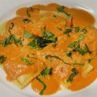 Lobster Ravioli · Ravioli filled with chunks of real lobster meat in a succulent pink sauce. Served with Itali...