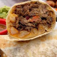 California Burrito · Ribeye Steak, cheese, French fries, pico de gallo, sour cream, and guacamole, wrapped in a f...