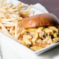 Mac Burger · 1/3 LB Angus beef, cheddar cheese, mayo, mac and cheese, and bacon on a brioche bun  served ...