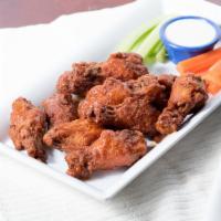 Wings · One pound of wings with your choice of sauce. Served with carrots and celery.