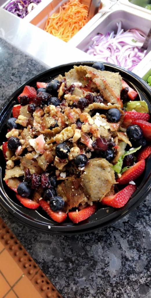 Berry What Salad · Romaine - Cucumber - Dried Cranberry - Strawberry - Blueberry - Grape Tomato - Feta Cheese - Cranberry Dressing - Walnut
