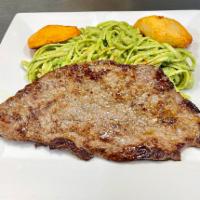 Tallarin Verde con Bistec · Spaghetti. Peruvian version of pesto, made with spinach and basil. Served with steak and fri...