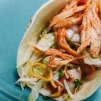 Chicken Taco · Fresh grilled chicken taco served in a soft flour tortilla filled with lettuce, cheese, and ...