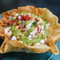 Taco Salad · Taco salad filled with the meat of your choice filled with lettuce, cheese, rice, beans, sou...