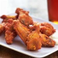 A10. Chicken Wings · 6 pieces. Marinated chicken wings with Thai taste specail sauce then deep-fried until crispy...