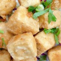 Fried Tofu · Deep-fried tofu covered with Gogi wheat flour. Served with a sweet dipping sauce.
