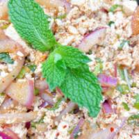 Larb  · Red onions, green onions, cilantro, and mint leaves, toasted rice powder in a spicy sauce. S...