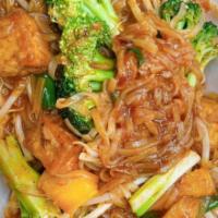 Mango Pad-Thai · Classic pad-thai noodles and mango sauce sautéed with green onions, bean sprouts, and ground...