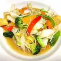 Veggie Deluxe · Sauteed mixed vegetables, glass noodles, onions, and mushrooms.