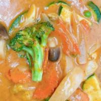 Panang Curry · Sweet Panang curry coconut sauce bell peppers, carrots, and broccoli.