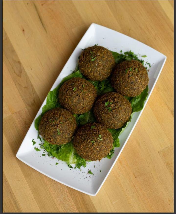 Falafel · 8 pieces. Vegetarian patties made with chick peas, onion fresh parsley, mild herbs, fried in vegetable oil served with tahini sauce and pita bread.  Vegetarian.