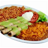 4 Taquito Plate · Spinach rice and beans.