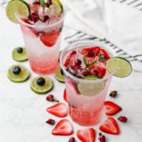 Rosey Mocktail  · Rose syrup with fresh fruit Ingredients and lose dry rose paddles with Sparkling Natural Min...