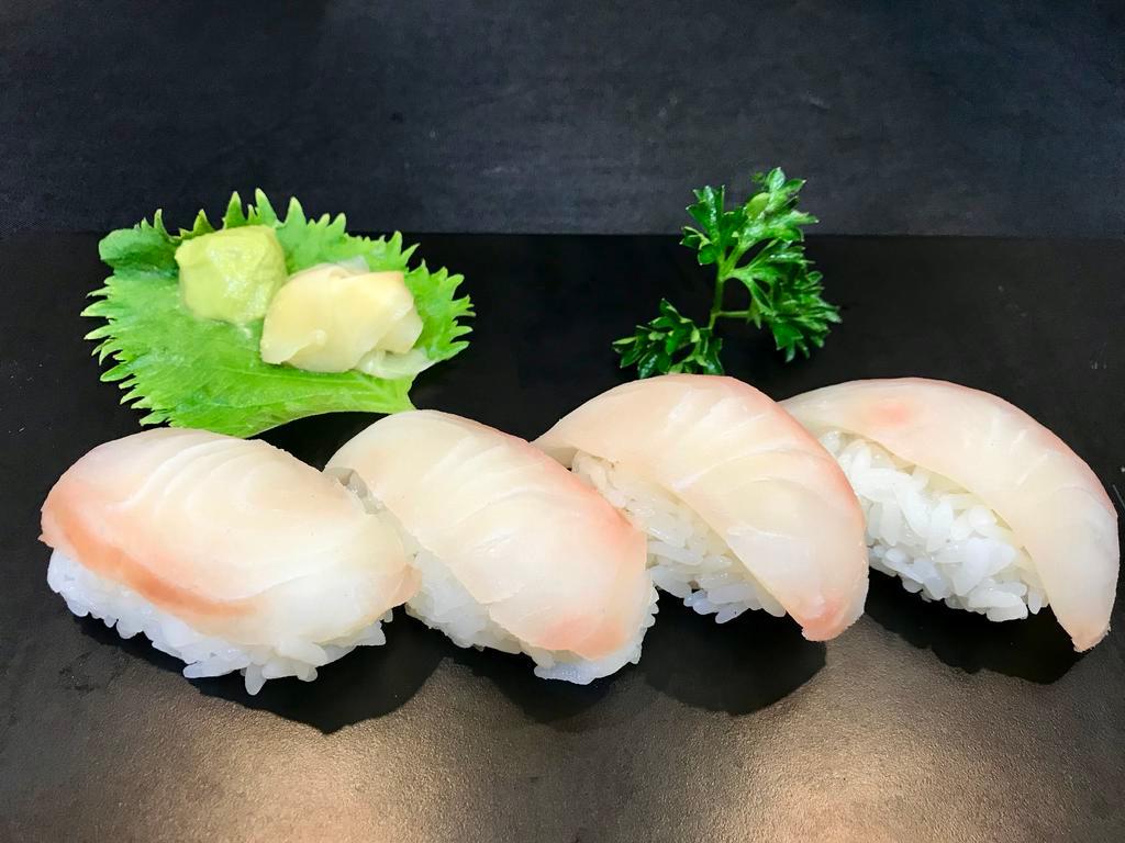 Red Snapper Nigiri · Sushi laid top of rice.