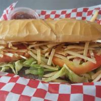 Pan con Bistec · Pan con bistec, authentic, with Cuban bread. Served with french fries.