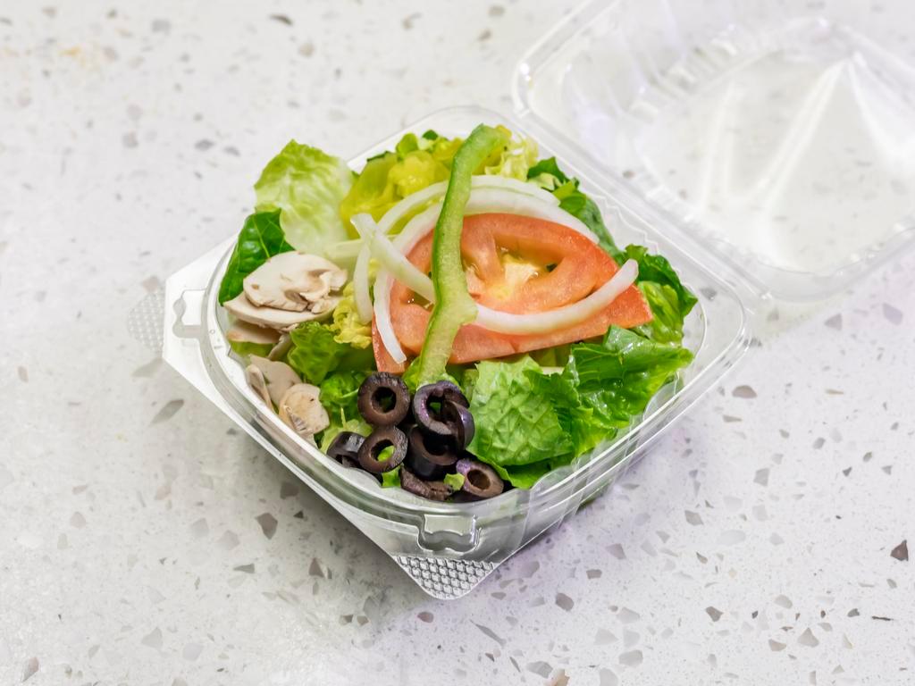 Personal Side Salad · Romaine lettuce with a mix of tomatoes, mushrooms, bell peppers, onion and black olives on top. Comes with your choice of ranch or Italian dressing.