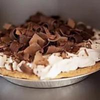 Chocolate  Cream Pie · Decadent chocolate pastry cream decorated with whipped cream and hand-shaved Guittard chocol...