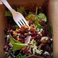 Italiano Salad · Walnuts, crumbled gorgonzola cheese, dried cranberries with baby mixed greens.