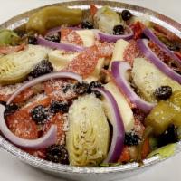 Antipasto Salad · Iceberg lettuce, roasted red peppers, garbanzo beans, red onions, sliced black olives, mozza...