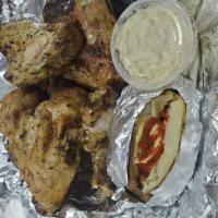 1/2 Broiled Chicken · Cooked in an oven.