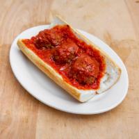 Homemade Italian Meatball Sandwich · Sandwich with seasoned meat that has been rolled into a ball.