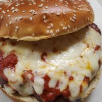 Pizza Burger · Meat patty with pizza sauce and cheese.