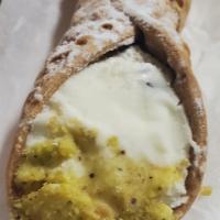 Cannoli  · Fried pastry with a sweet creamy filling.