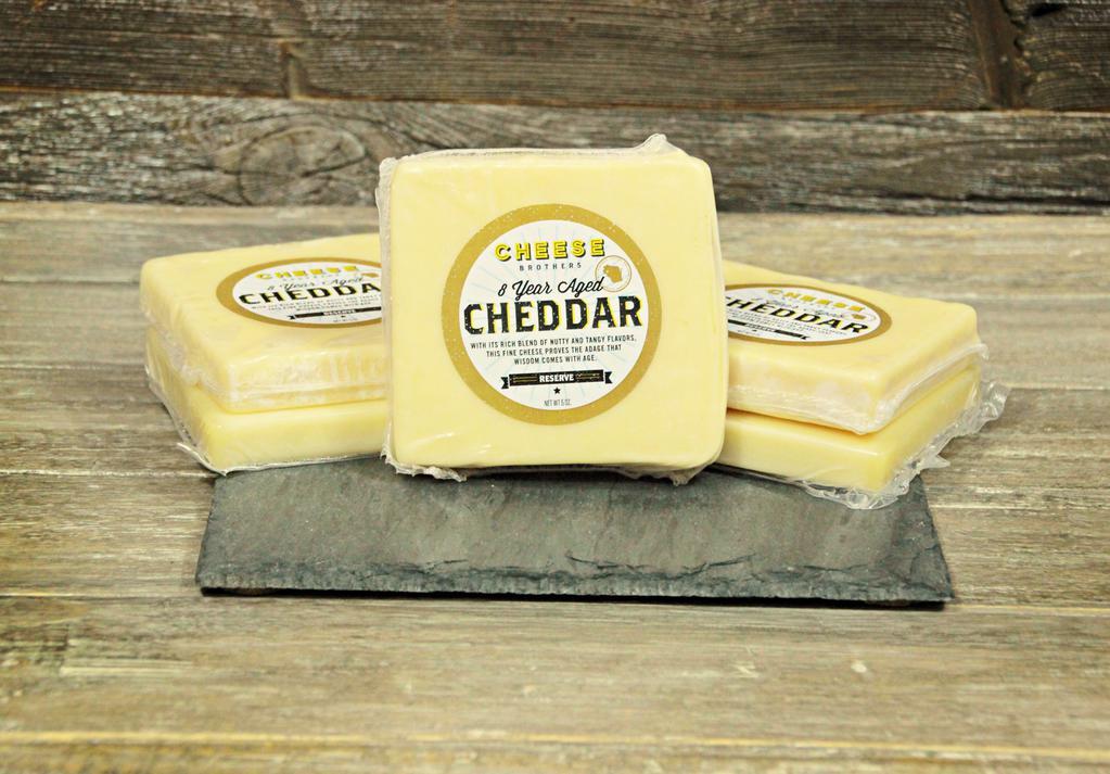 8-Year Aged 5 oz. Cheddar Cheese · Served with blend of nutty and tangy flavors.