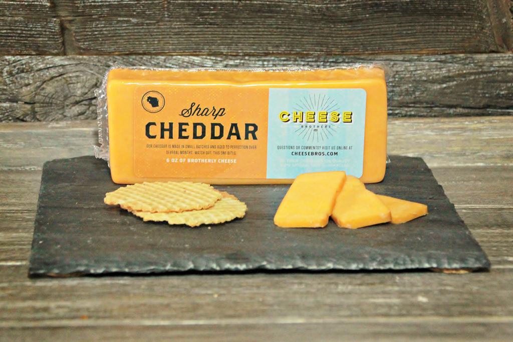 Sharp Cheddar Cheese 6 oz. · Made in small batches and aged to perfection over several months. 6 oz.