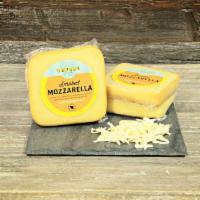 6 oz. Smoked Mozzarella Cheese · Natural smoky flavors from wood-fired smoking ovens.