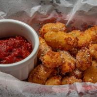 Garlic Parmesan Cheese Curds · Cheese curds served with our rustic marinara sauce.