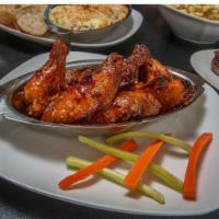 Taproom Hot Wings · Tender chicken wings tossed in our in signature hot sauce, mild, garlic Parmesan or BBQ.
