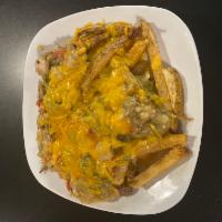 Chili Cheese Fries · Generous portion of hand-cut fries served smothered in green chili and topped with cheddar c...