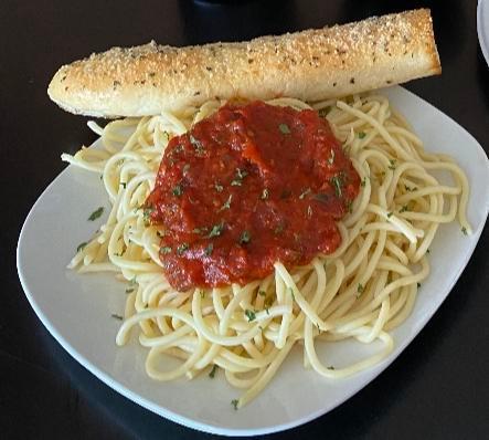 Spaghetti with Meat Sauce · A healthy portion of spaghetti with our signature meat sauce, served with a salad and bread stick.