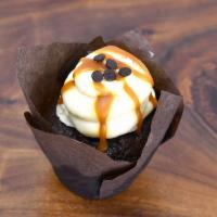 7oz. Gluten Free Chocolate Cupcake · A gluten free chocolate cupcake topped with salted caramel buttercream and salted caramel dr...