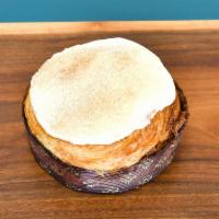 Cinn-A-Sant Cinnamon Roll · Made from layers and layers and layers of buttery goodness with a swirl of a cinnamon walnut...