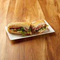 Italian Combo Sandwich · Prosciutto, Genoa salami, capicollo, mortadella and provolone with lettuce, tomato and vinai...