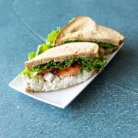 Chicken Salad Sandwich · Served with lettuce, tomato and pickles on the side and dressed with regular mayonnaise and ...