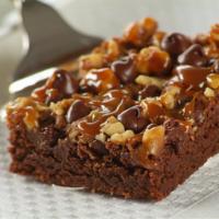 Turtle Brownie · Chocolate brownie topped with caramel, pecans and chocolate chips.