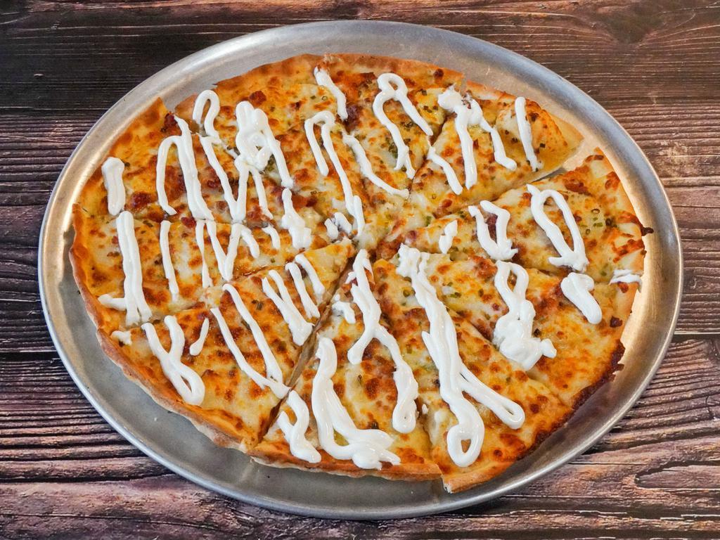 Loaded Baked Potato Pizza · Ranch base, sliced potatoes, butter, real bacon, chives, mozzarella, and cheddar cheese.