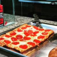Square Pizza · Pizza made with special cheese blend and McCormick's Perfect Pinch signature seasoning. Come...